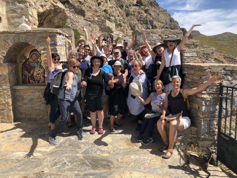 Group in front of stone wall Amorgos Greece walking tour vacation art travel journal workshop