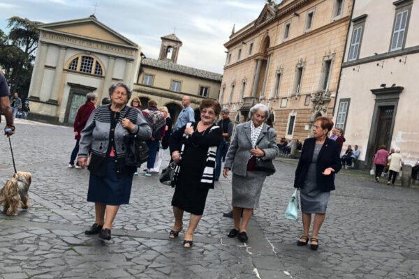 Senior Italian women walking in piazza duomo Ovieto umbria walking vacation
