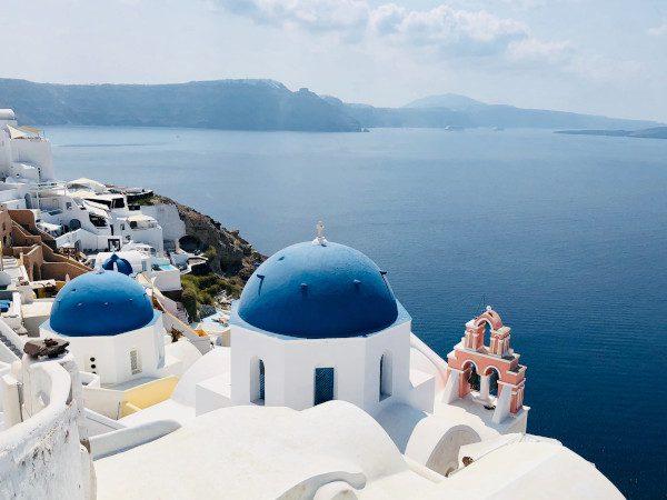 Santorini blue domes walking vacation in Greece
